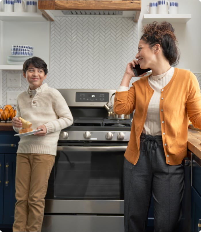 Conversation on the phone in kitchen