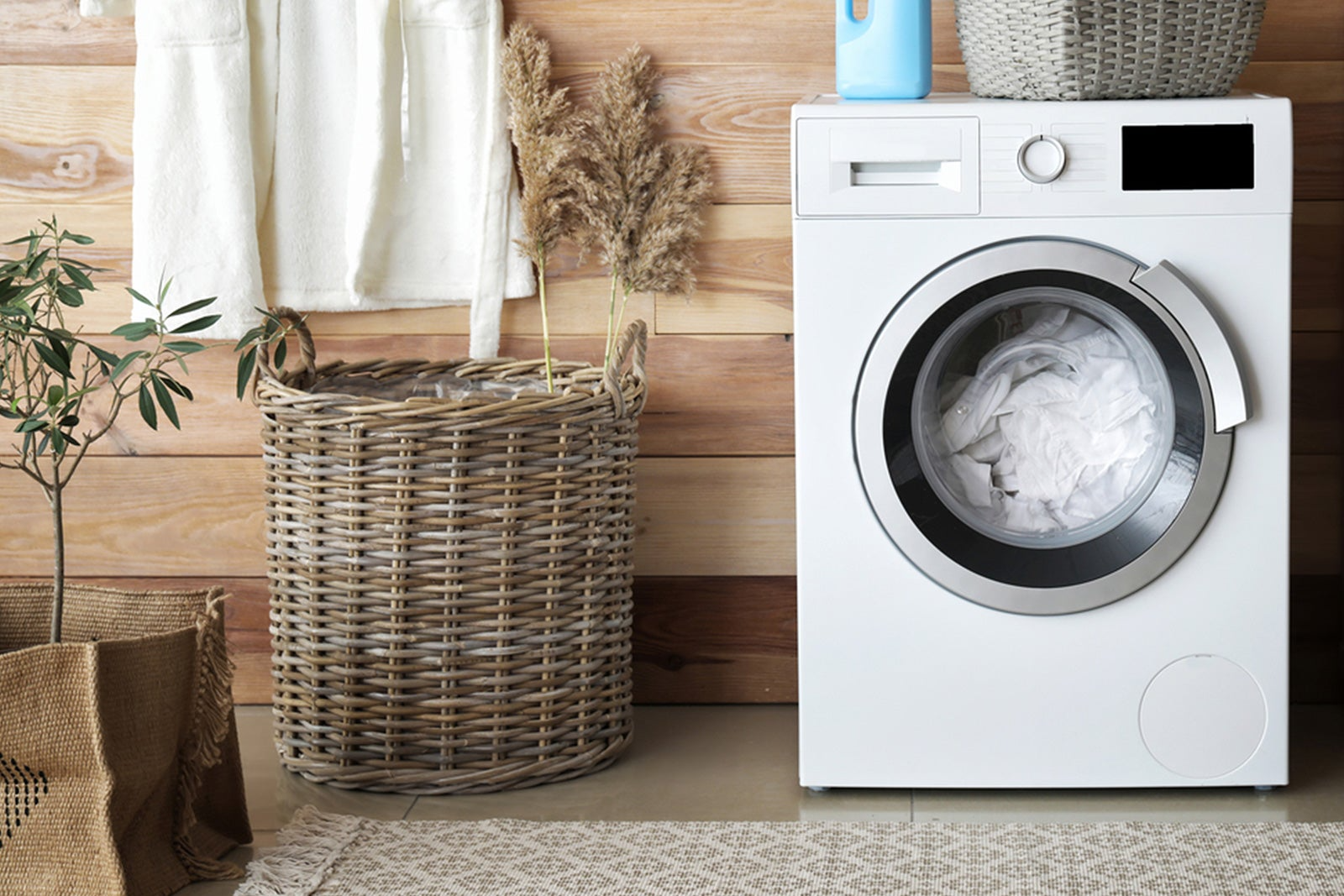 Dryer next to laundry basket