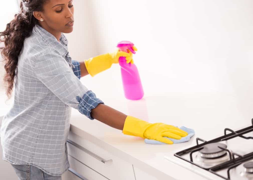 Woman cleaning table
