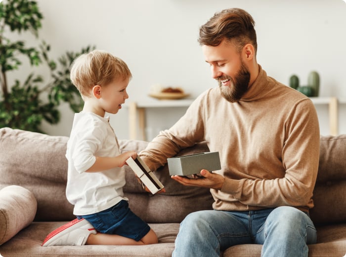 Dad playing with his young son