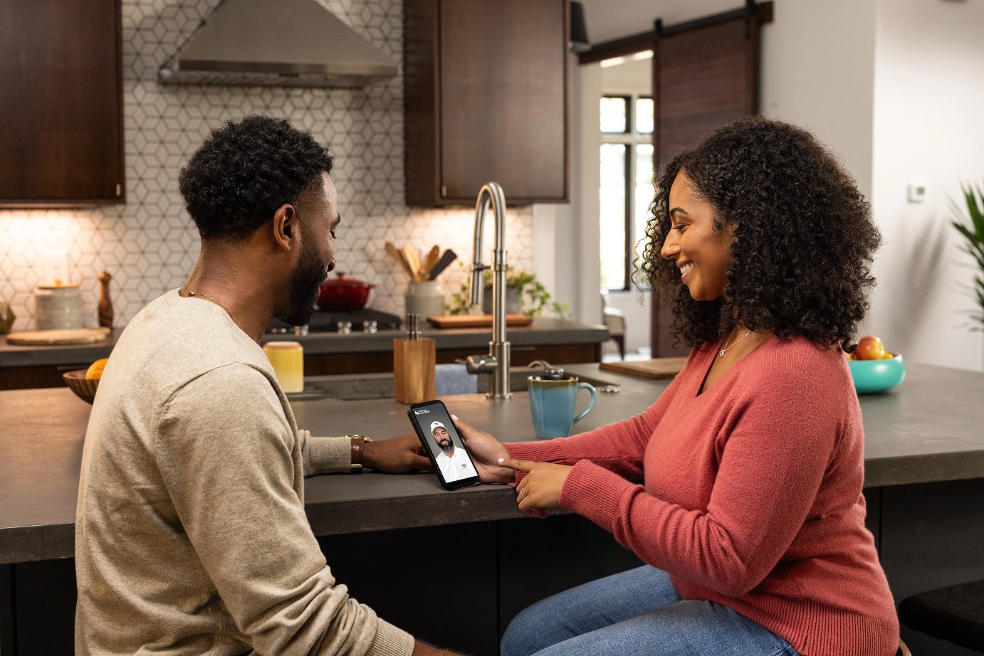 Couple having a live video conversation with an expert