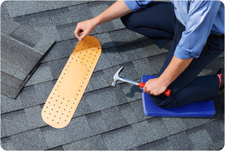 Roof with band-aid on it