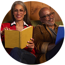 Couple sitting together for relaxed reading