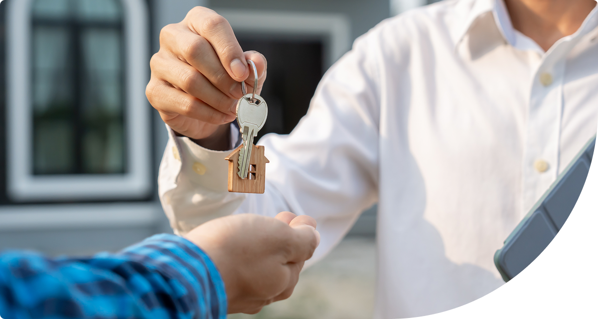 Handing keys to homeowner