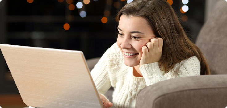 young woman using laptop