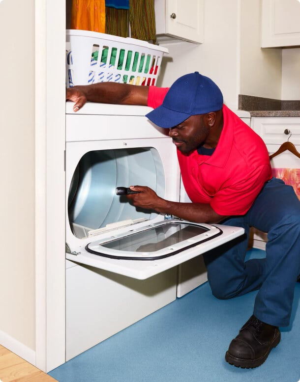Man fixing washing machine