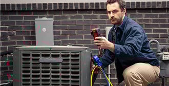 Technician inspecting a device